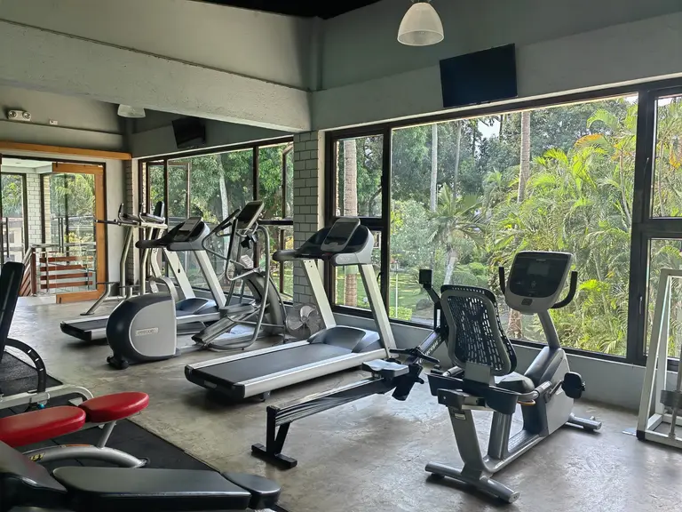 Cardio and strength equipment inside the Batangas Country Club Fitness Center.