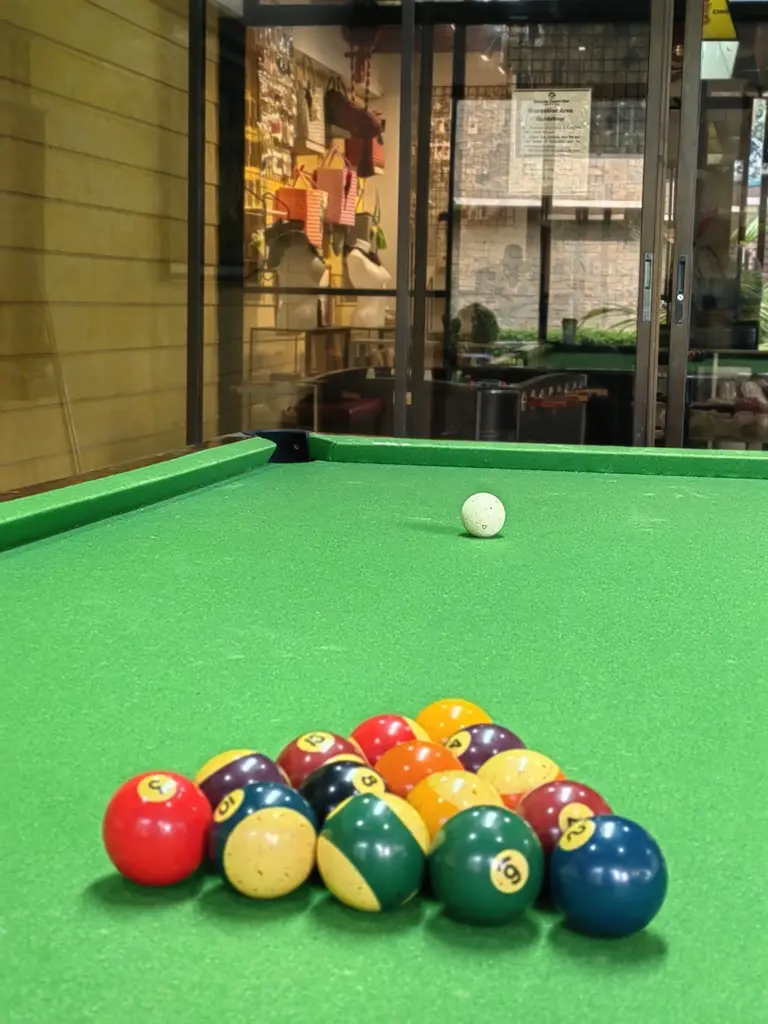 Billiards, darts, and board games in the Batangas Country Club Recreation Area.